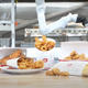 Image for article titled From Butcher Bots to Robo Burger Flippers: 6 Ways the Food Industry's Turning to Tech in 2022